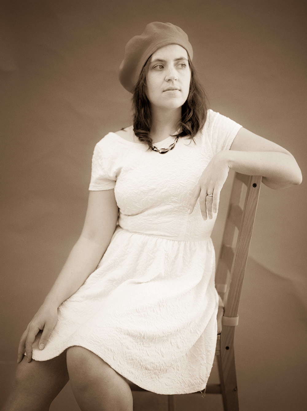 Amy Portrait sitting on chair